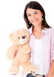 Photo: Woman holding a teddy bear Woman holding a teddy bear