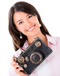 Woman with a vintage camera