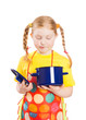 Photo: beautiful little girl with a pan isolated on white beautiful little girl with a pan isolated on white