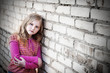 girl on background brick wall