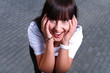 portrait of a beautiful girl joking
