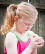 little girl with little chicken