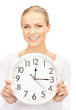 Foto: businesswoman with wall clock businesswoman with wall clock