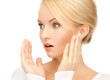 amazed woman with hands up
