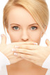 amazed woman with hand over mouth