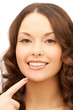 woman touching her chin
