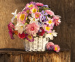 bouquet of spring flowers in a basket