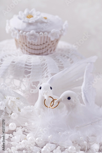 Photo: White doves with rings White doves with rings