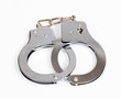 A pair of handcuffs isolated over white with clipping path