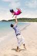 Father and daughter enjoy time at beach