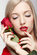 blonde woman with rose