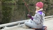 Girl trout fishing.