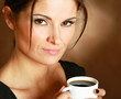 Photo: Portrait of a woman drinking coffee Portrait of a woman drinking coffee