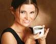 Photo: Portrait of a woman drinking coffee Portrait of a woman drinking coffee