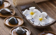 White frangipani with zen stone