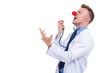 clown doctor singing karaoke on his stethoscope