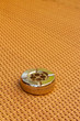 The ashtray placed on the wicker.