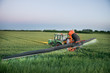 Tractor spraying on the field