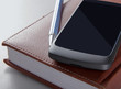 Photo: notebook and phone notebook and phone