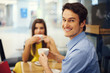 Smiling handsome man at a meeting