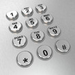 Illustration: Metallic pay phone keypad Metallic pay phone keypad