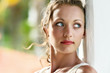 Portrait of a dreaming girl with blue eyes