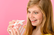 Elated girl opening gift