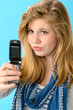 Young girl taking picture of herself