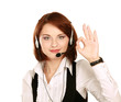 Woman with headset showing OK , isolated on white background