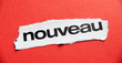 Foto: nouveau mot sur fond rouge nouveau mot sur fond rouge