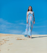 walking on the white sand