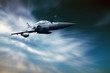 Military airplan on the speed in the sky