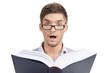 Foto: Surprised man with a book Surprised man with a book
