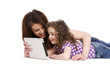 Mother and daughter using a computer tablet