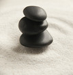 Photo: pierres noires zen dans le sable pierres noires zen dans le sable