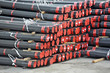 Stacked PVC and steel pipe ready for shipment