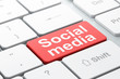 Social network concept: Social Media on computer keyboard backgr
