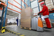 Photo: forklift loader with cardboard freight moving in storehouse forklift loader with cardboard freight moving in storehouse