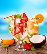 Summer drinks with blur beach on background