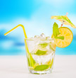 Summer drink with blur beach on background
