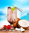Summer drink with blur beach on background