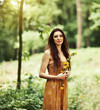 Portrait of a beautiful girl in the spring forest.