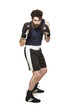 Male boxer in boxing stance ready to fight