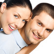 Photo: Portrait of young couple, isolated Portrait of young couple, isolated