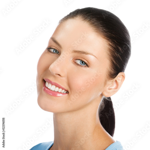 Photo: Happy smiling young woman, over white Happy smiling young woman, over white