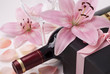 Wine, gift and lily