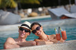 happy young couple have fun on beach