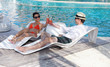 happy young couple have fun on beach