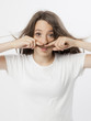 Photo: funny expression and gesture of a real young girl funny expression and gesture of a real young girl