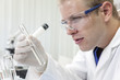 Photo: Male Scientist or Doctor With Test Tube In Laboratory Male Scientist or Doctor With Test Tube In Laboratory